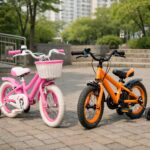 16인치 어린이 자전거 두 대가 나란히 서 있는 모습, 핑크색과 오렌지색