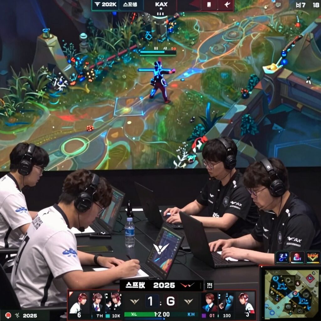 LCK 2026 스프링 결승전에서 선수들이 집중하여 게임을 하는 장면, 화면에는 게임 인터페이스가 보인다